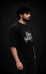 Black drop shoulder oversized t-shirt with Elitewear X logo print